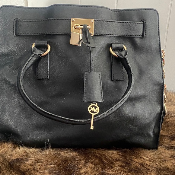 Michael Kors Handbags - Michael Kors Black Satchel with Gold Accents